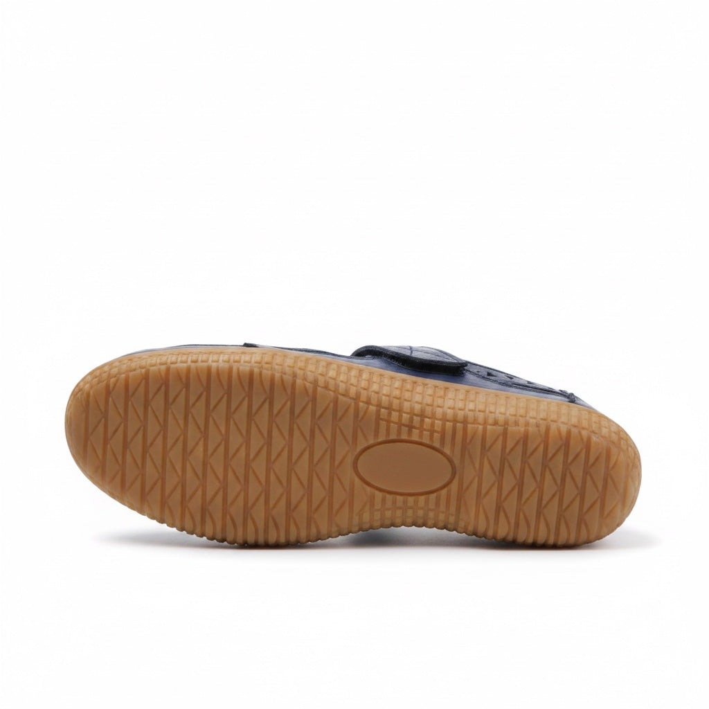 Bottom view of a Navy Blue comfort sandal showing its textured brown rubber traction sole