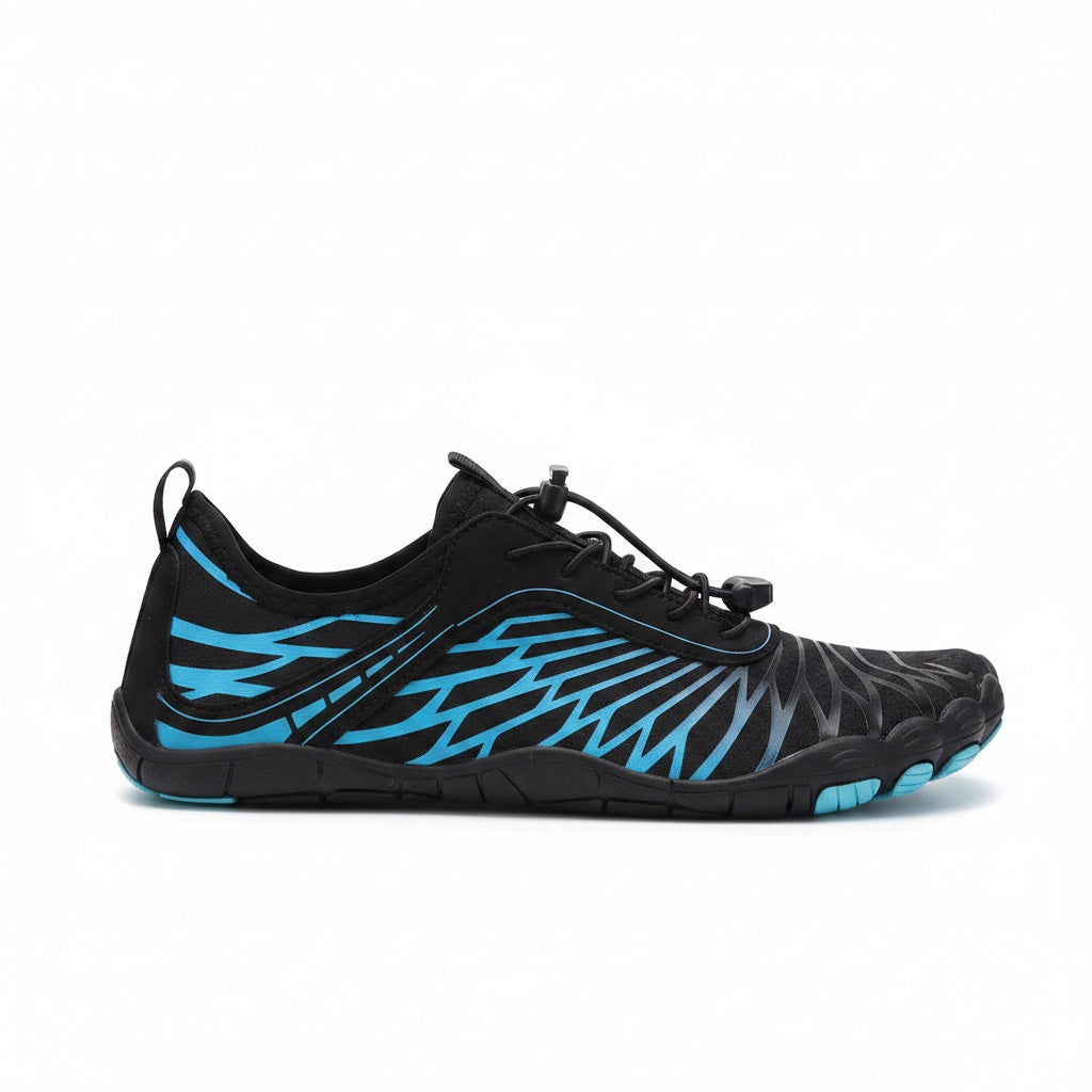 Black and blue Nomad barefoot shoe shown from the side, highlighting its lightweight design and flexible outsole.