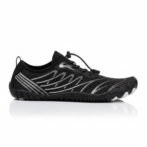 Black Nomad barefoot shoe shown from the side, highlighting its lightweight upper and minimalist construction.