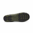 Bottom view of an olive green barefoot shoe showing its textured traction sole