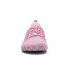 Front view of a pink unisex barefoot shoe with flexible sole and breathable upper