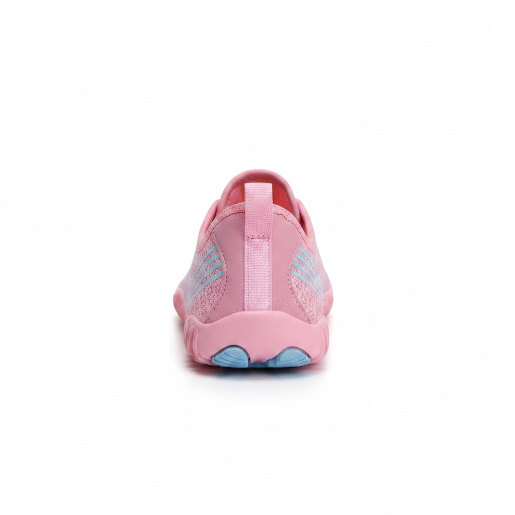 Rear view highlighting the heel structure and pink outsole detailing.