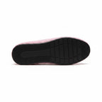 Bottom view of pink water shoe with textured sole
