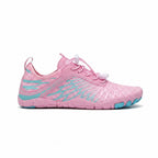 Side profile of pink barefoot shoes showing the lightweight upper, flexible sole and minimalist design