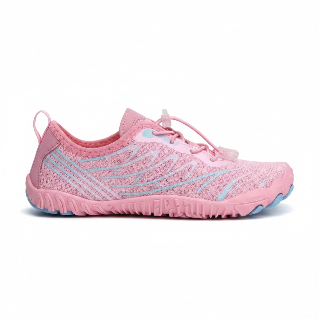 Side profile of the pink barefoot shoe showing its flexible sole and lightweight minimalist design.