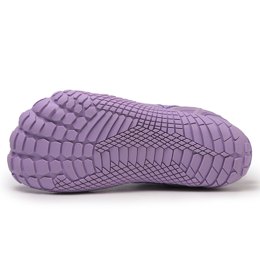 Purple textured shoe sole on a side view.