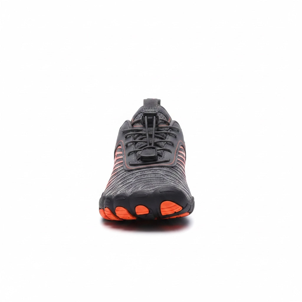 Front view of the black and red Veiro Nomad barefoot shoe showing the natural foot-shaped design.