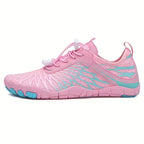 Angled view of the pink Veiro Nomad barefoot shoes showing the breathable upper and flexible outsole.
