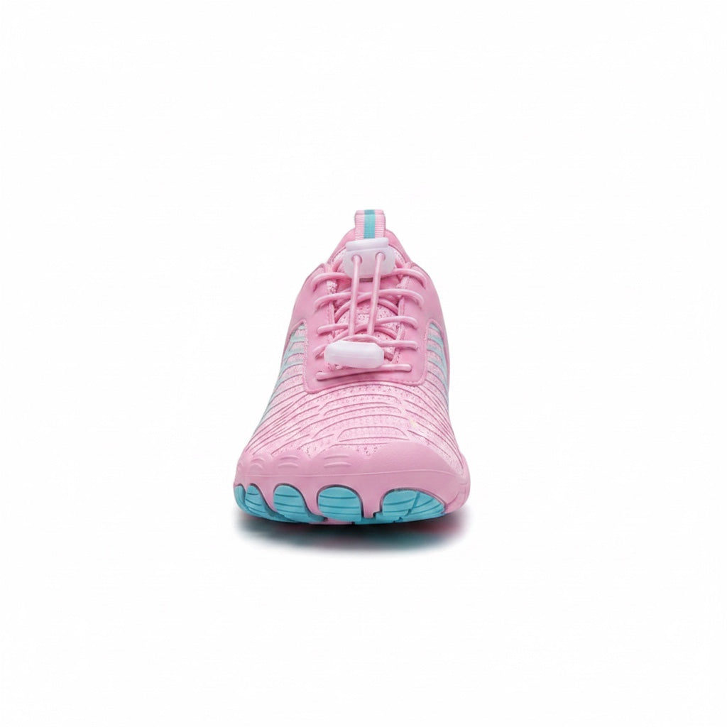 Front view of the pink Veiro Nomad barefoot shoe showing the natural foot shaped design and spacious toe area.