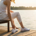 White Nomad barefoot shoes worn during an outdoor walk, demonstrating their lightweight everyday style.