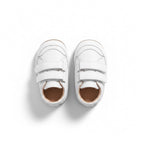 Top view of a pair of white baby shoes with adjustable double straps