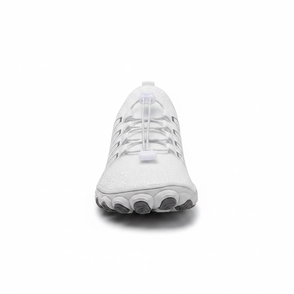 Front view highlighting the wide toe box and natural shape of the white barefoot shoe.