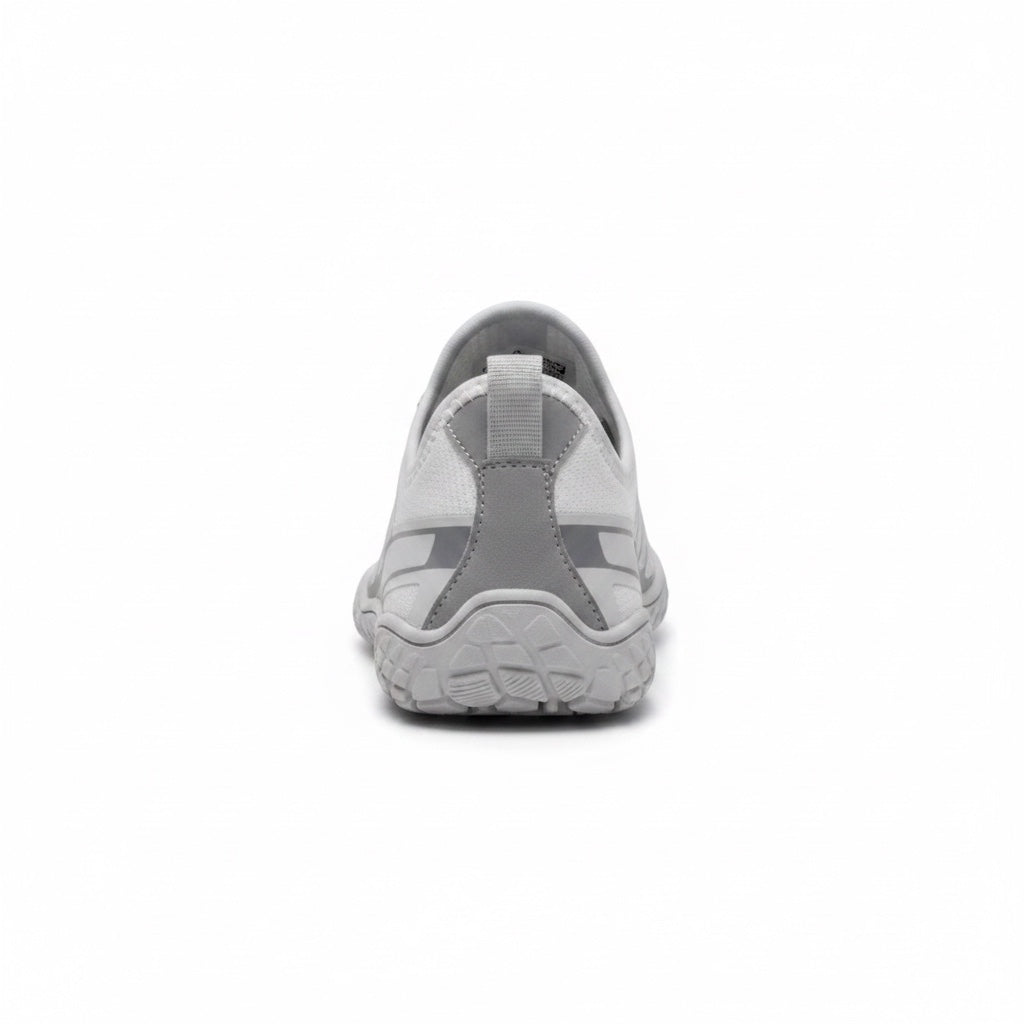 Rear view highlighting the heel structure and overall minimalist construction.