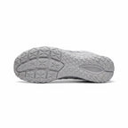Bottom view showing the textured outsole designed for flexibility, grip and natural movement.