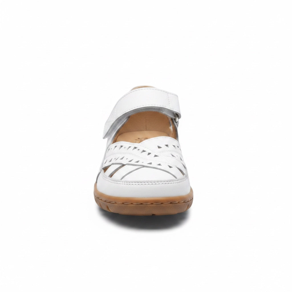 Front view of a white women's comfort sandal with adjustable strap and open cutout design