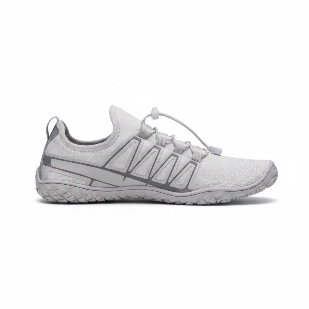 Side profile highlighting the flexible sole, minimalist construction and lightweight design.