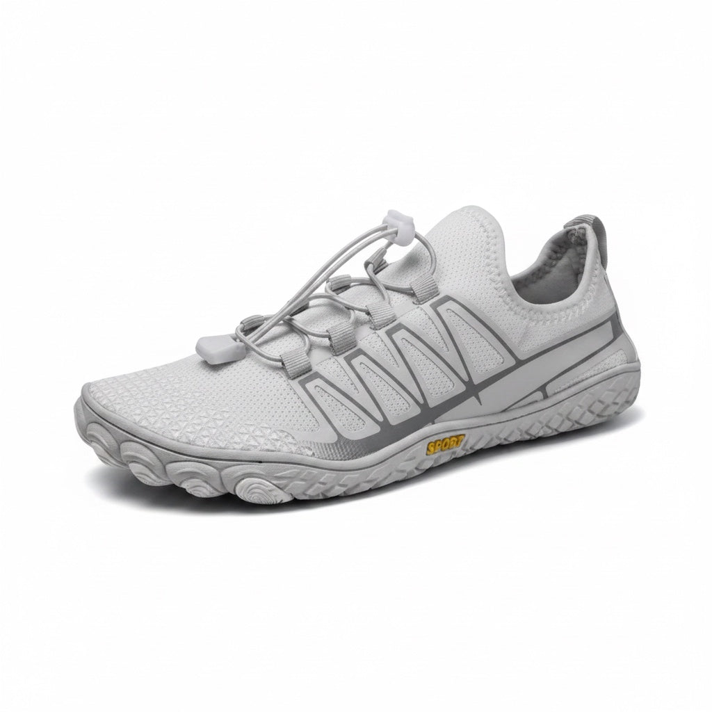 Angled side view showing the breathable upper, wide toe box and flexible outsole.