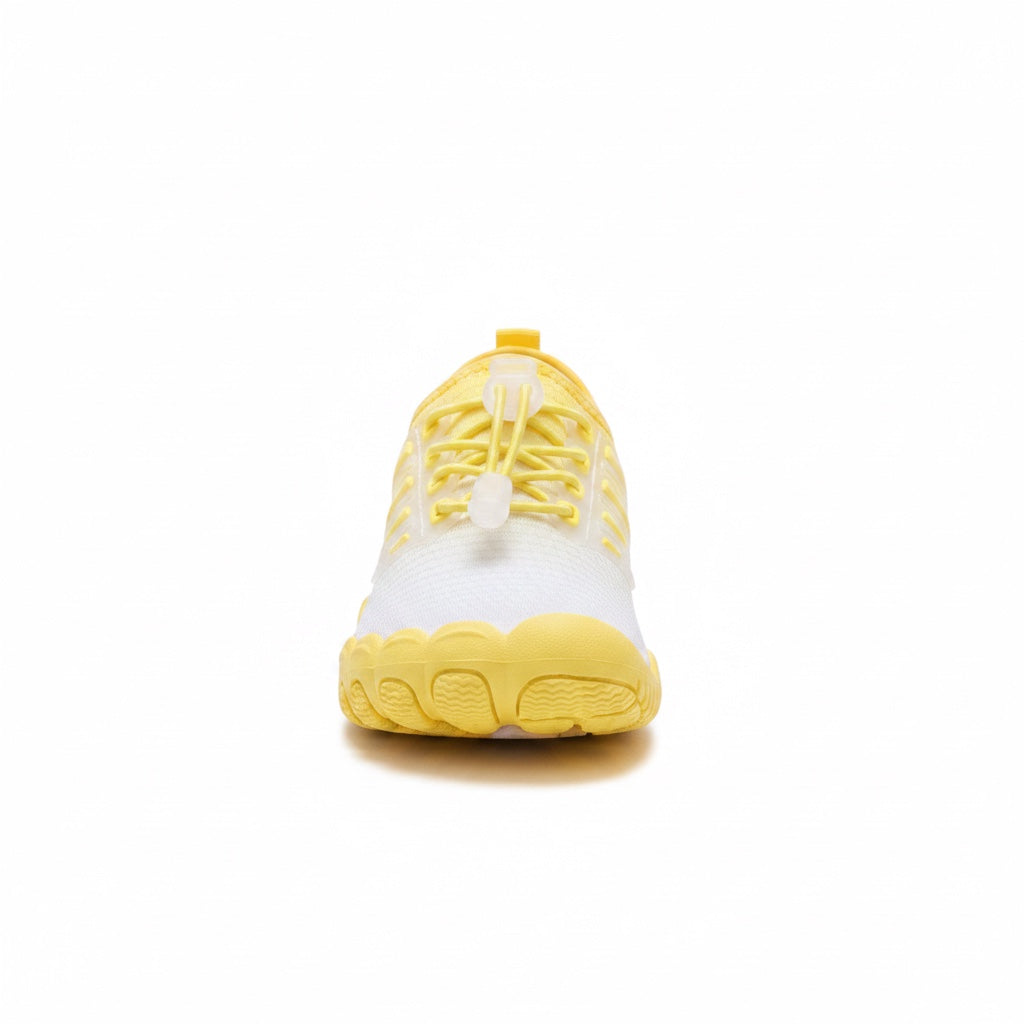 Front view of a yellow barefoot water shoe showing its rounded flexible toe area
