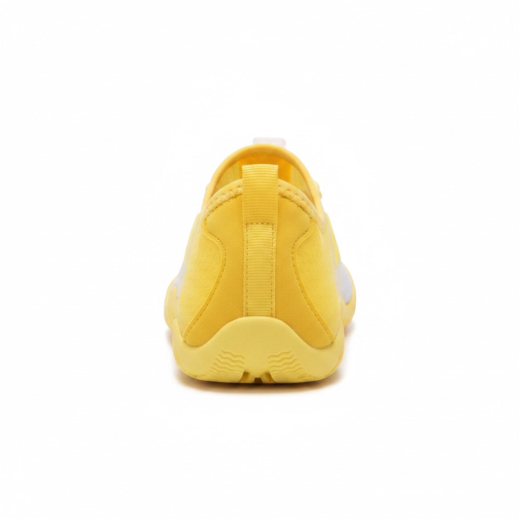 Rear view of a yellow barefoot water shoe with a lightweight flexible construction