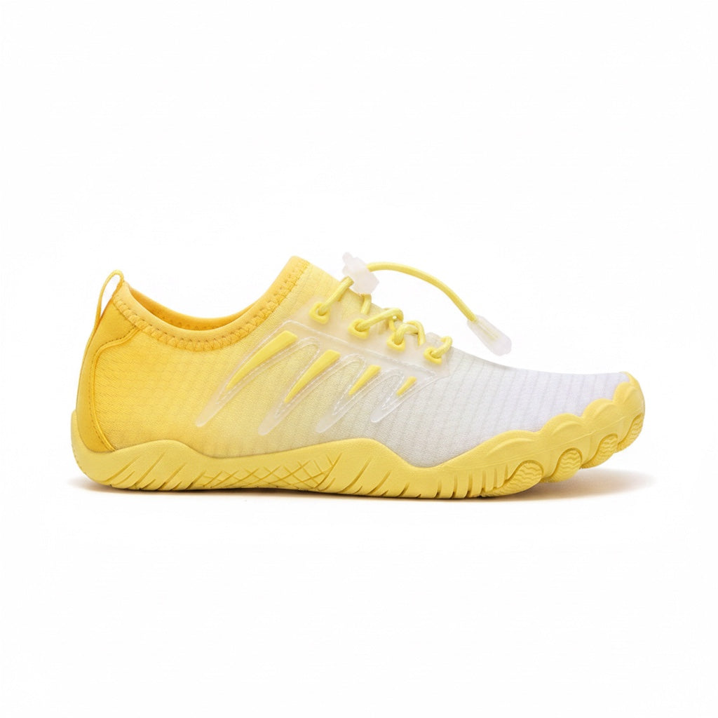 Bright yellow barefoot water shoe with a flexible rubber sole and lightweight upper