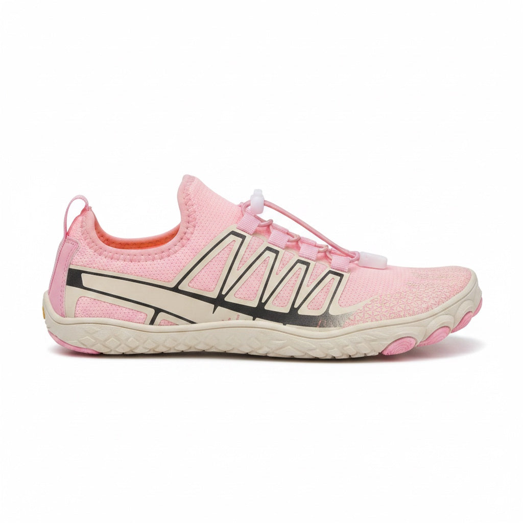 Side profile of the pink unisex barefoot shoe showing its lightweight design, flexible sole and breathable upper.