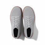 A pair of light grey knit lace up sneakers shown from a top-down view.
