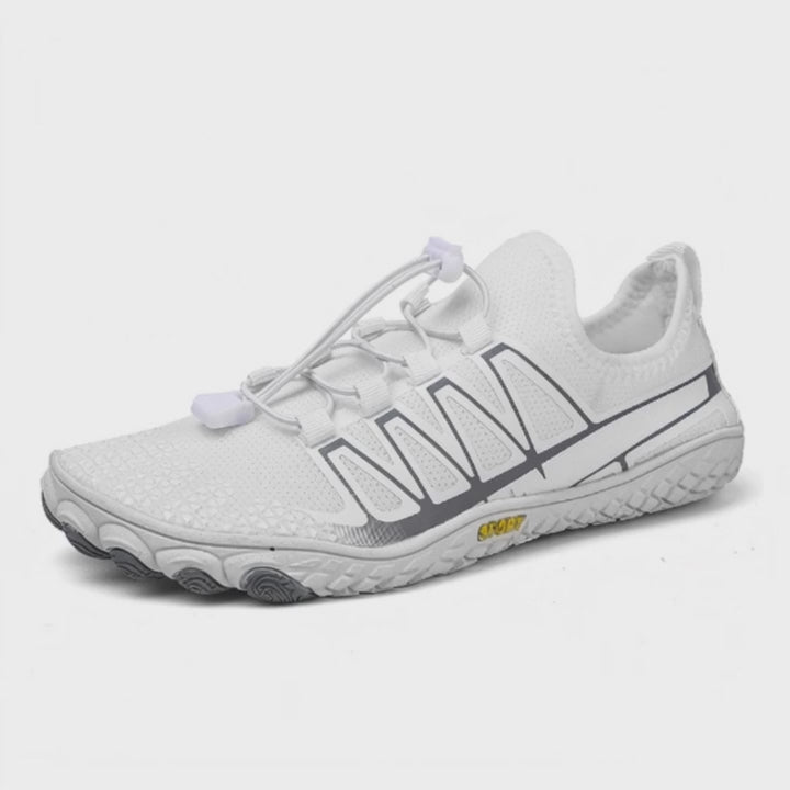 White barefoot shoes presented from an angled view, highlighting their lightweight design and flexible construction.